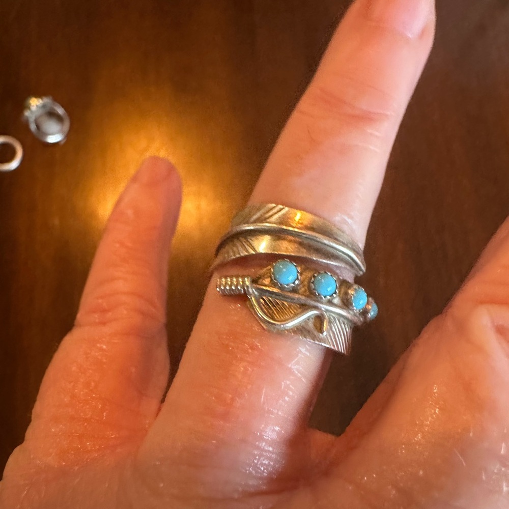 Silver and Blue Sculptural Ring with Intricate Design